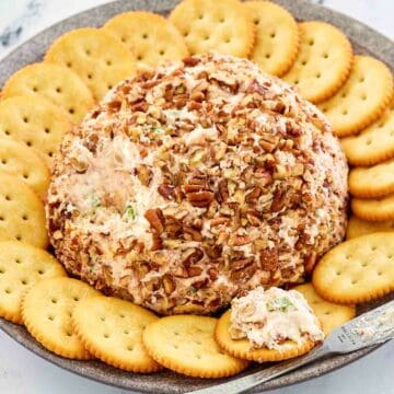 deviled ham cheese ball with pineapple coated in pecans.