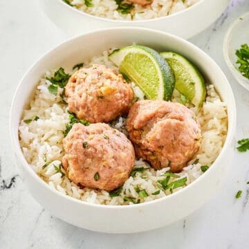 Asian pork meatballs and rice in a bowl.
