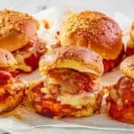 meatball sliders on parchment paper.