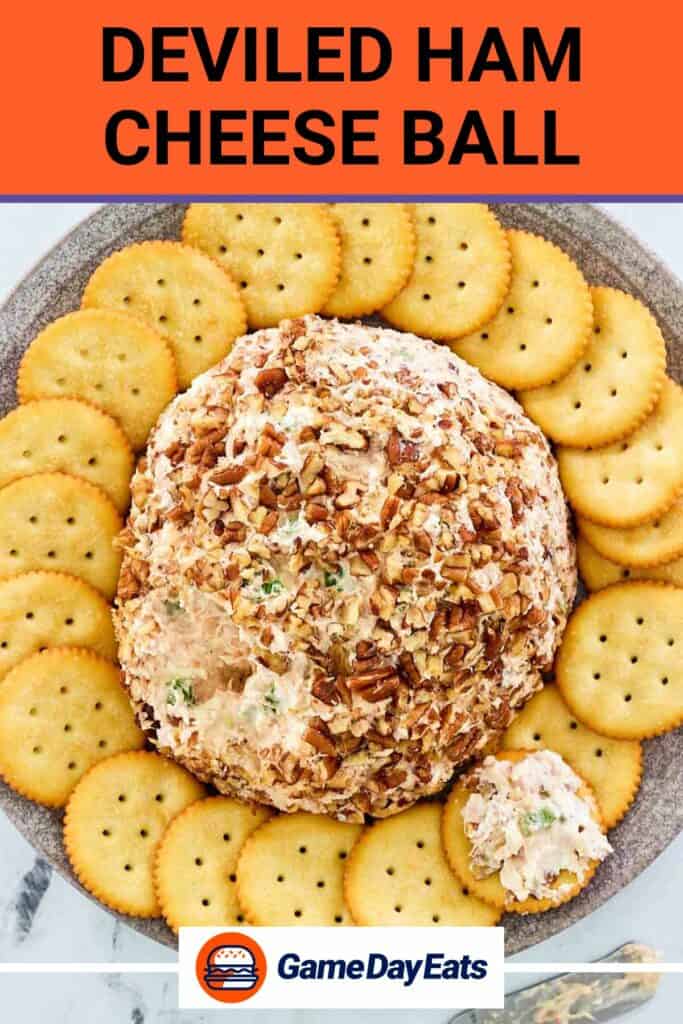 overhead view of deviled ham cheese ball coated with nuts.