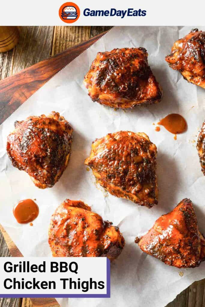 overhead view of grilled barbecue chicken thighs.