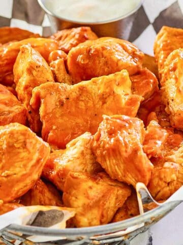 closeup of grilled buffalo chicken bites.