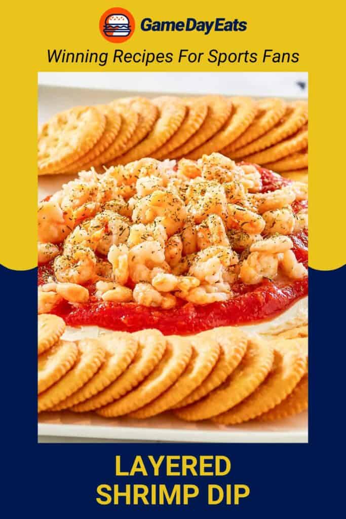 layered shrimp dip and butter crackers.