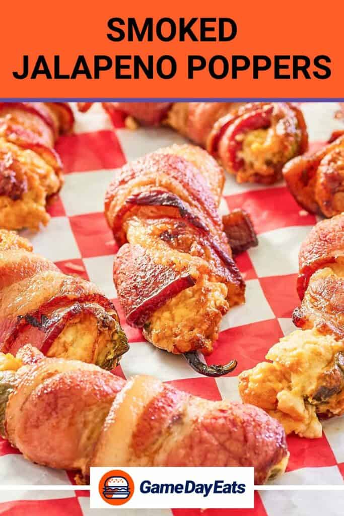closeup of bacon wrapped jalapeno poppers with cheddar and cream cheese.