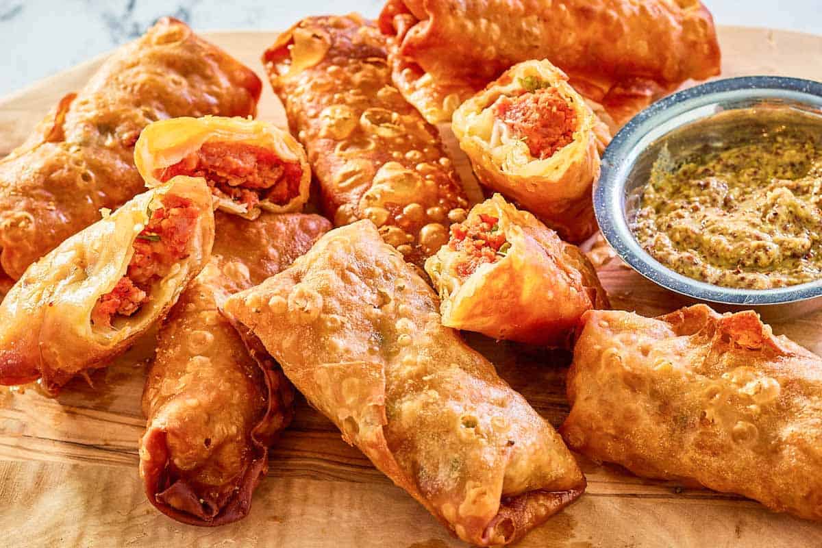 Homemade boudin egg rolls and mustard dipping sauce.