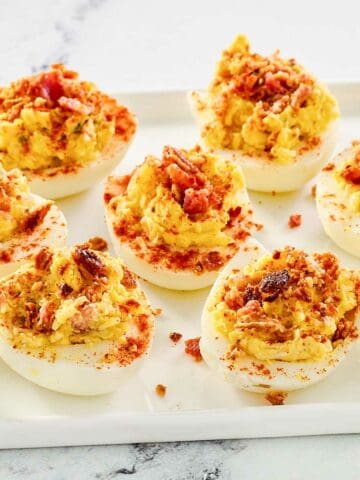 Bacon ranch deviled eggs with cheddar cheese.