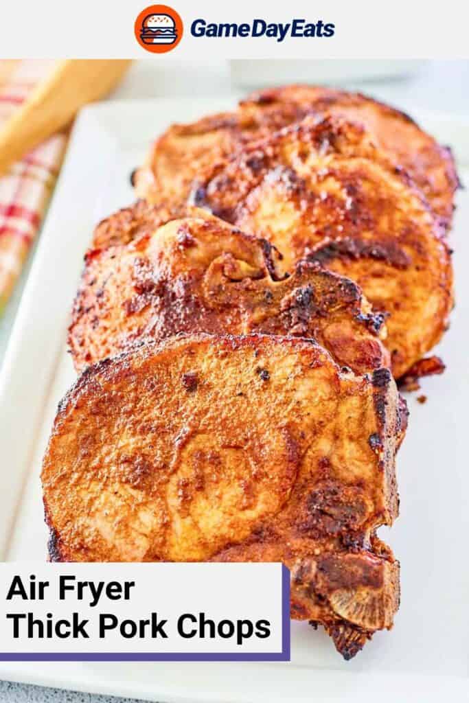 Four air-fried pork chops on a white platter.