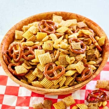 Smoked Chex mix in a wood bowl.