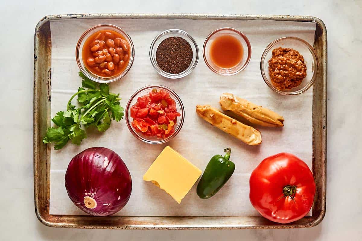 Tamale dip ingredients on a tray.
