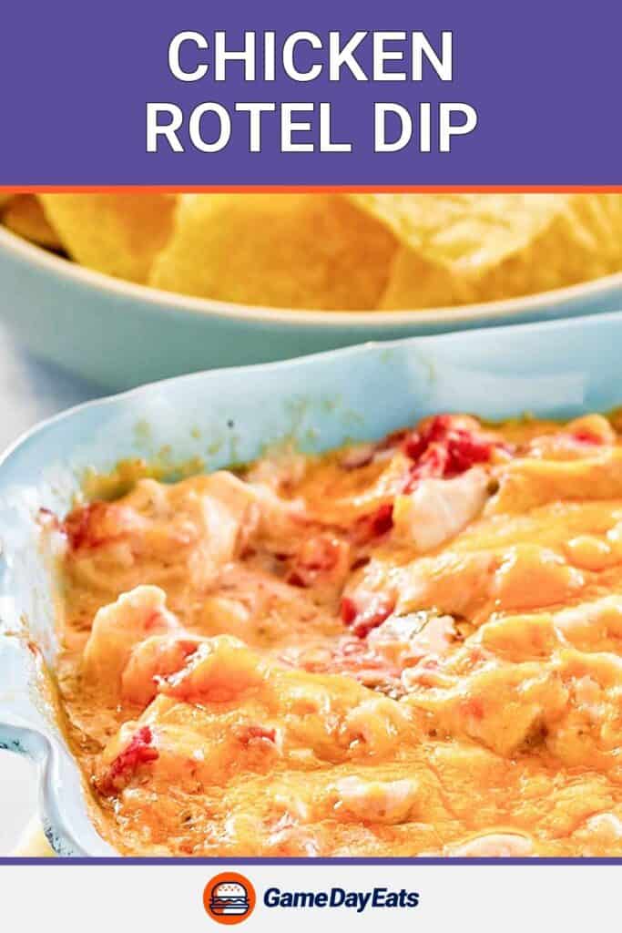 Closeup of rotel dip with chicken in a baking dish.