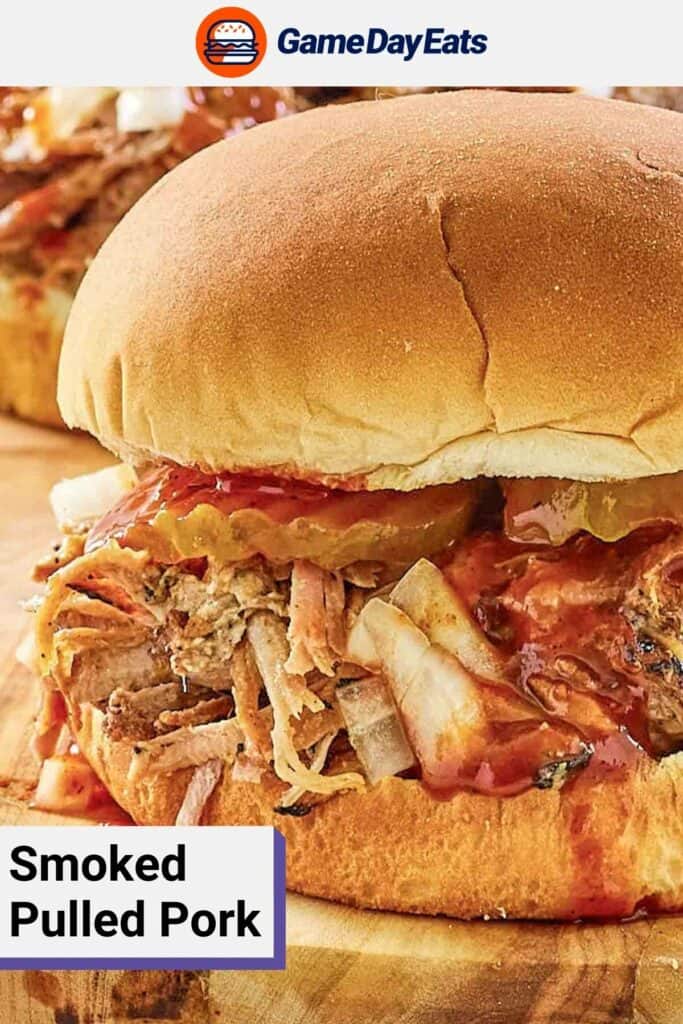 Closeup of smoked pulled pork in a sandwich.