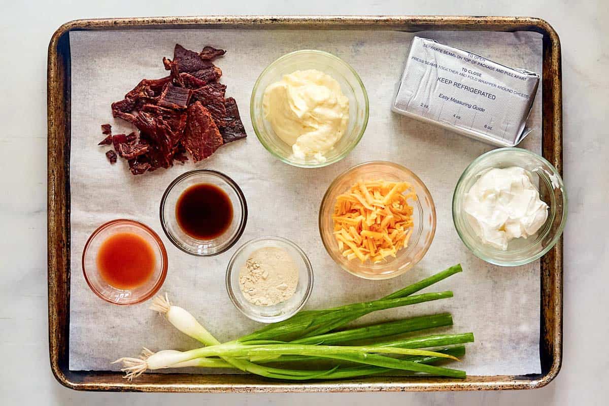 Beef jerky dip ingredients on a tray.