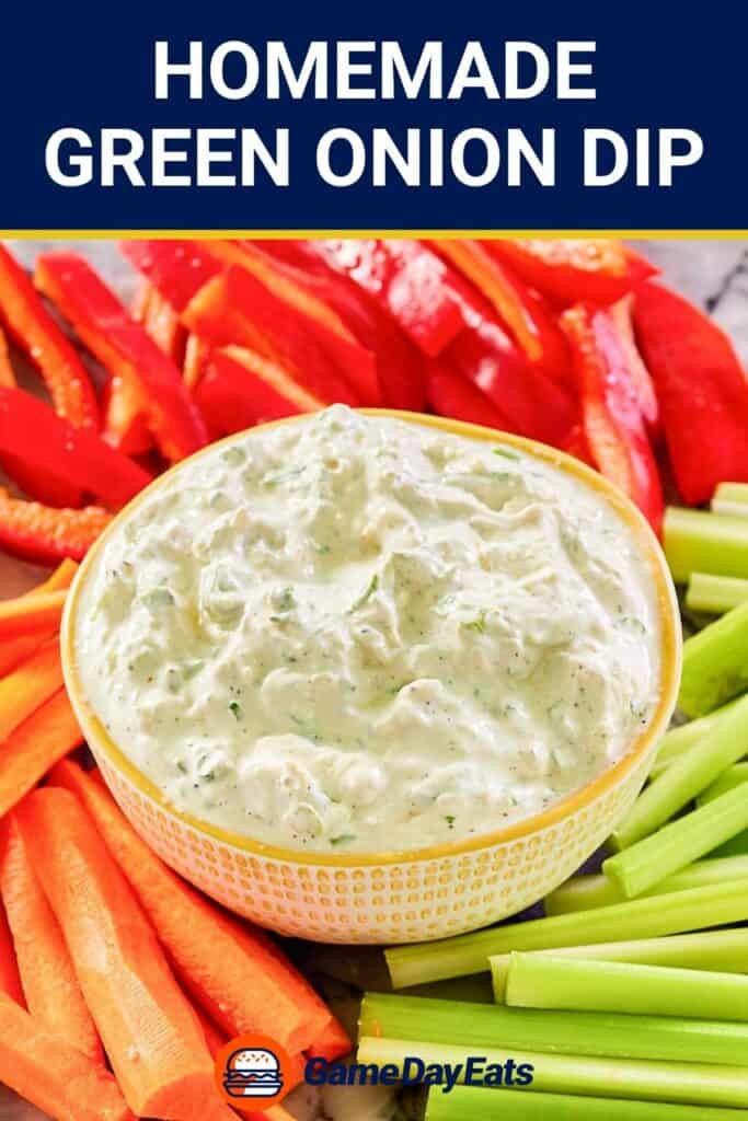 Green onion dip in a bowl and fresh veggies around it.