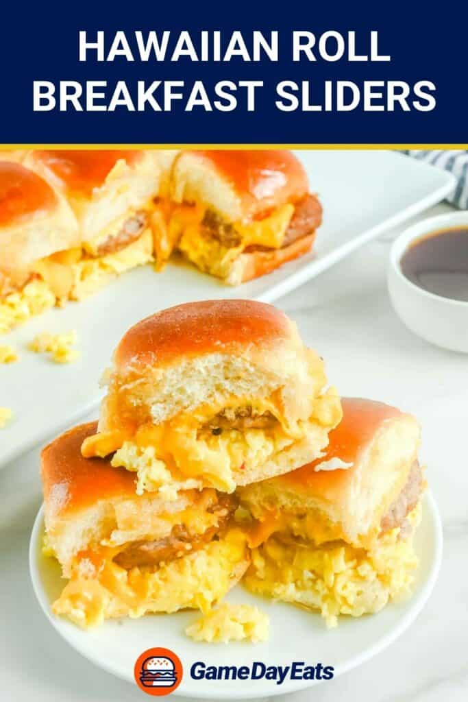 Sausage, egg, and cheese Hawaiian roll breakfast sliders on a plate.