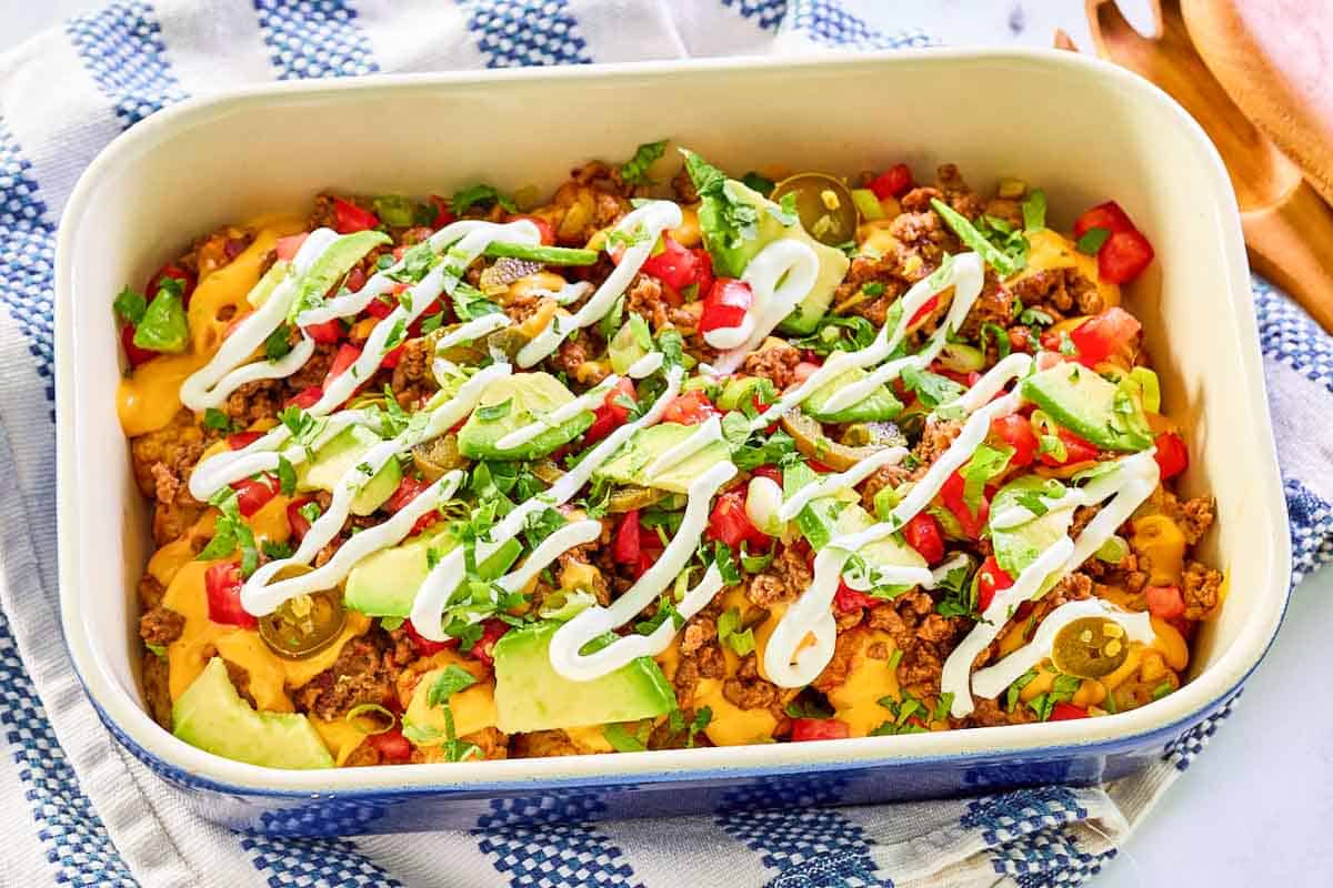 Ground beef totchos loaded with toppings.