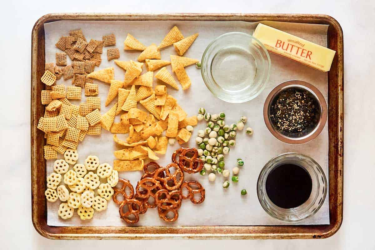 Homemade Furikake Chex Mix ingredients on a tray.