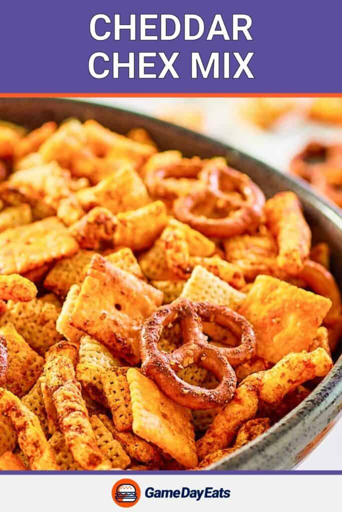 Cheddar Chex mix in a serving bowl.