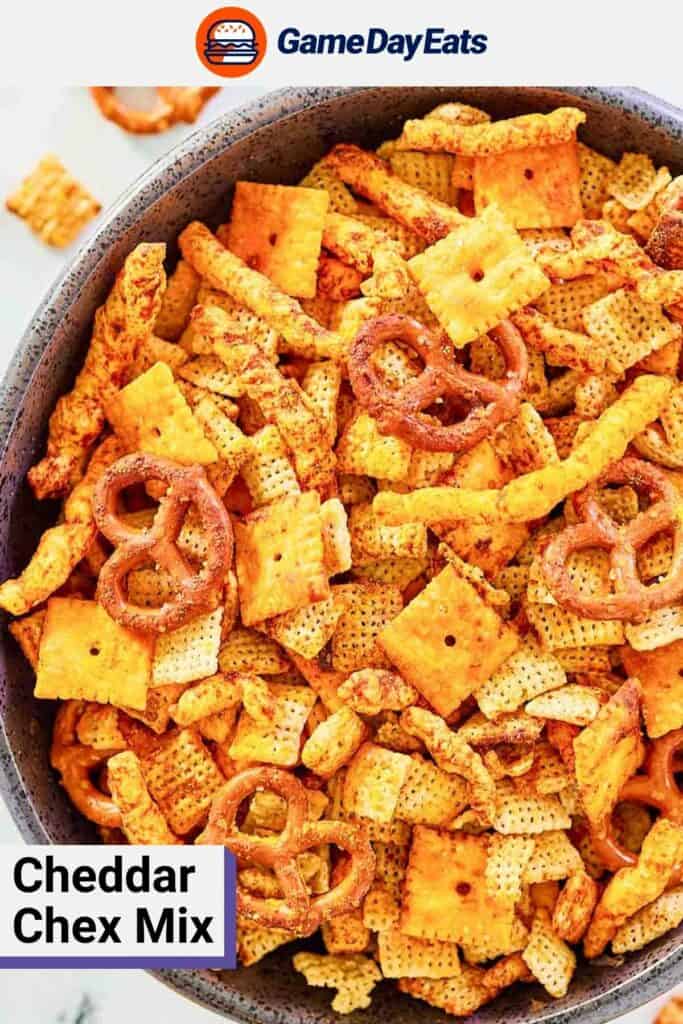 Cheddar Chex mix in a large serving bowl.