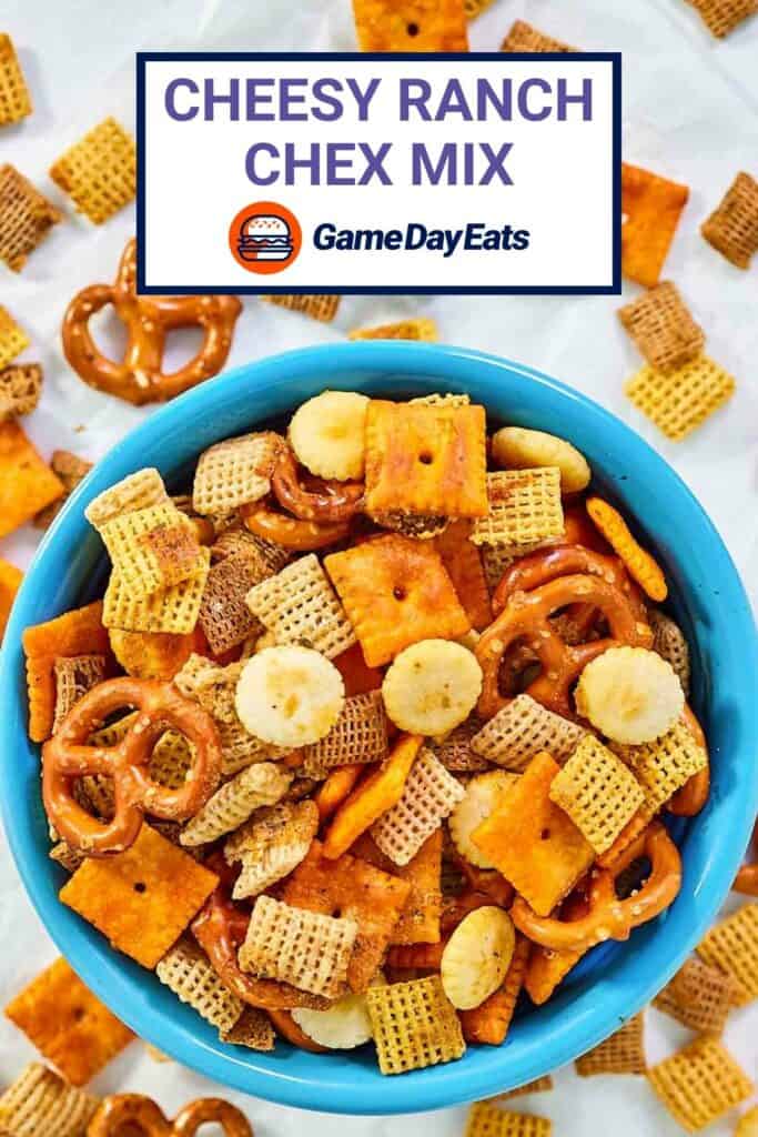 Cheesy ranch chex mix in a bowl and scattered around it.