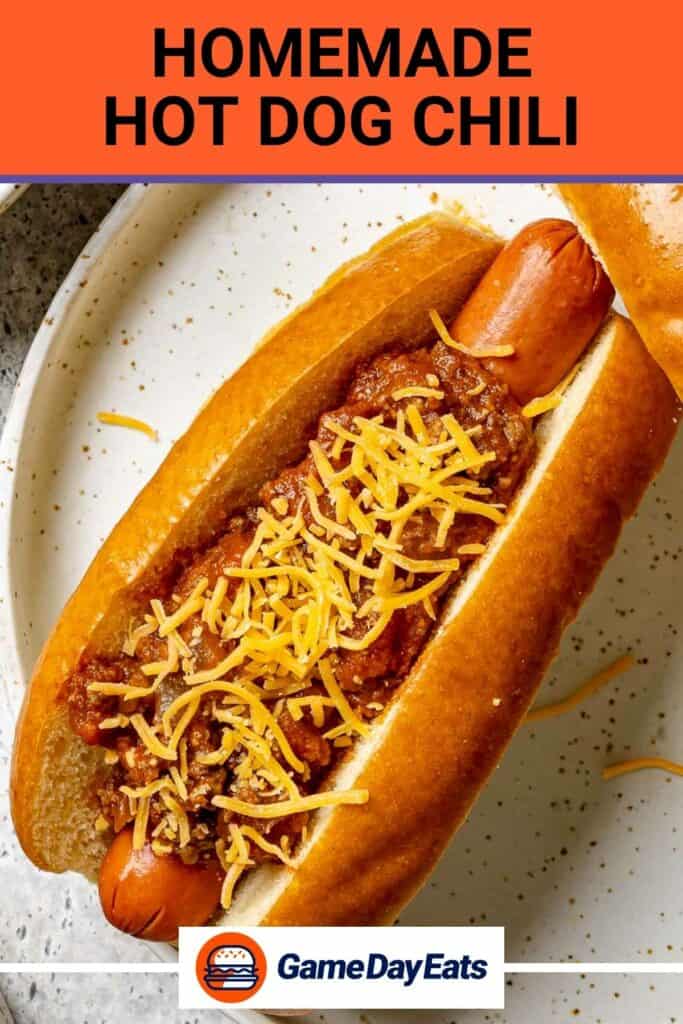 A hot dog topped with homemade hot dog chili and cheese.