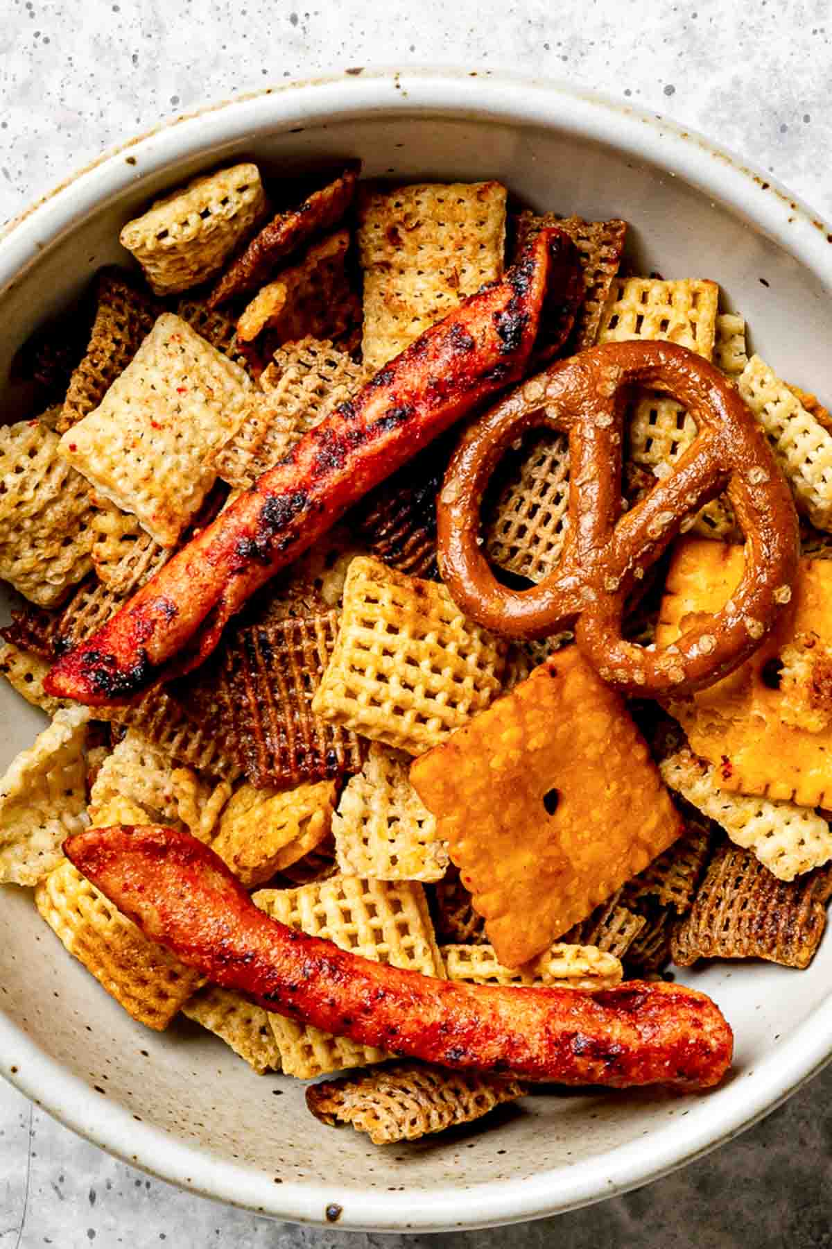 Homemade spicy Chex party mix in a bowl.