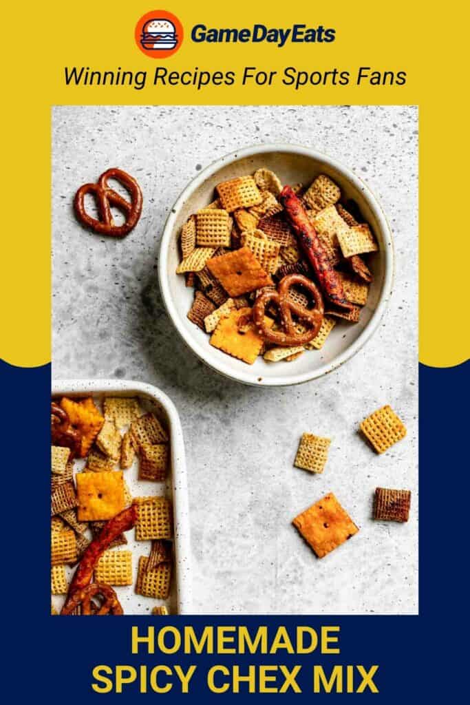 Spicy Chex mix in a bowl and scattered by it.